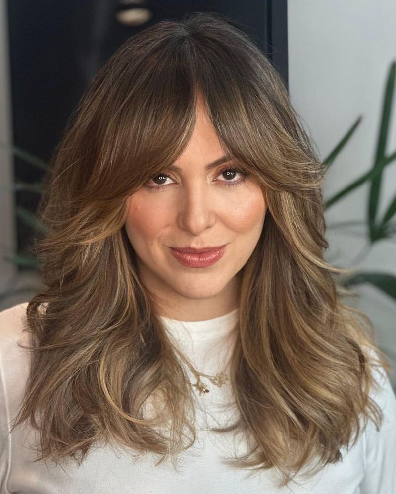 Voluminous Curtain Bangs with Layers