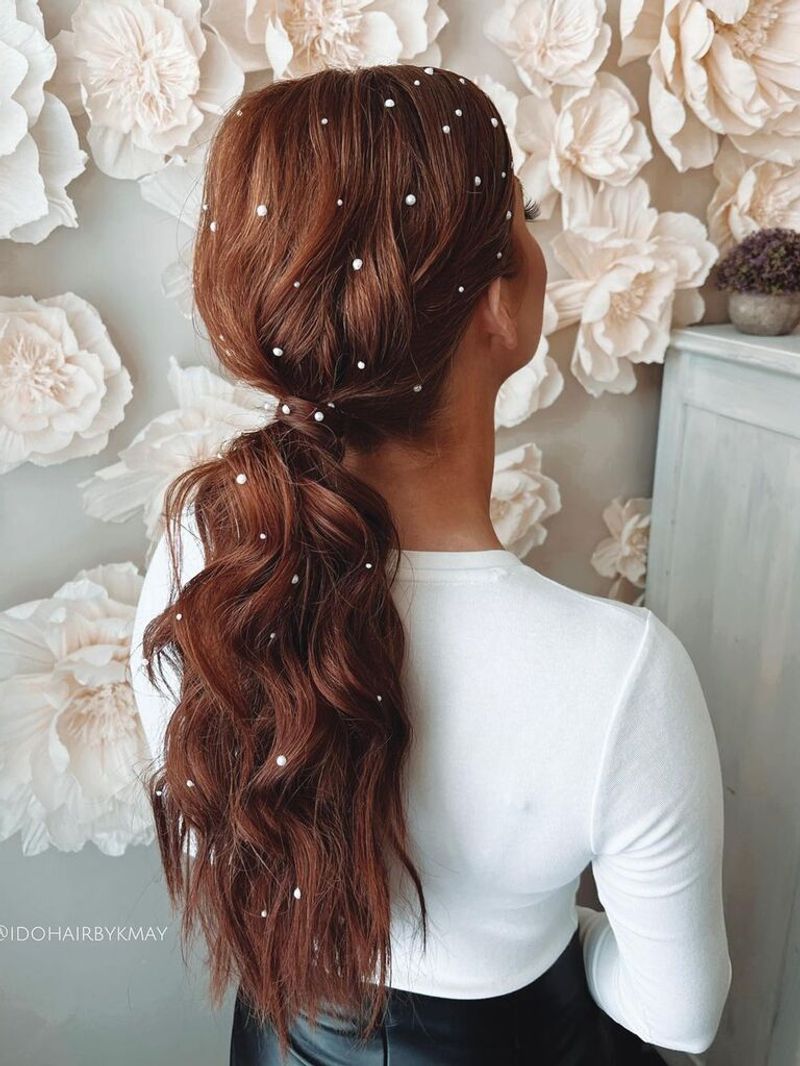 Low Curly Ponytail with Volume