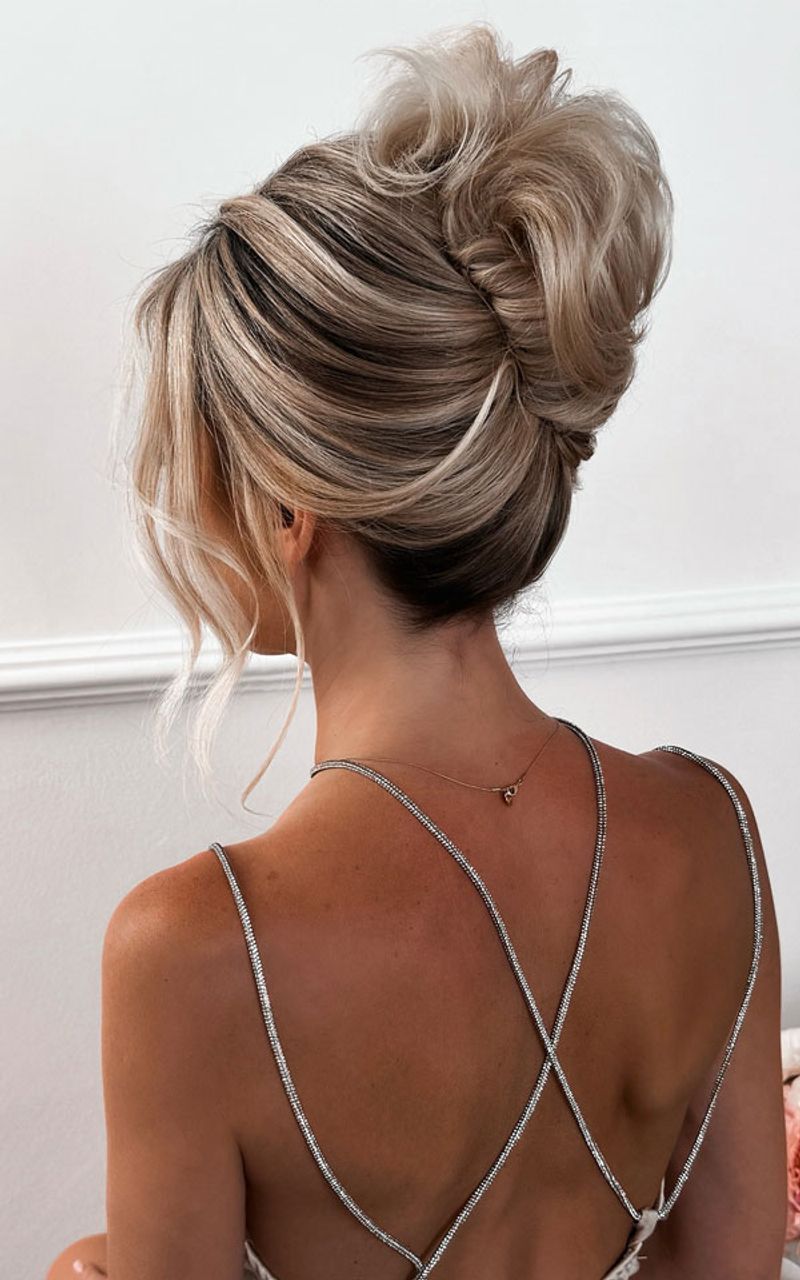 French Twist with Loose Tendrils